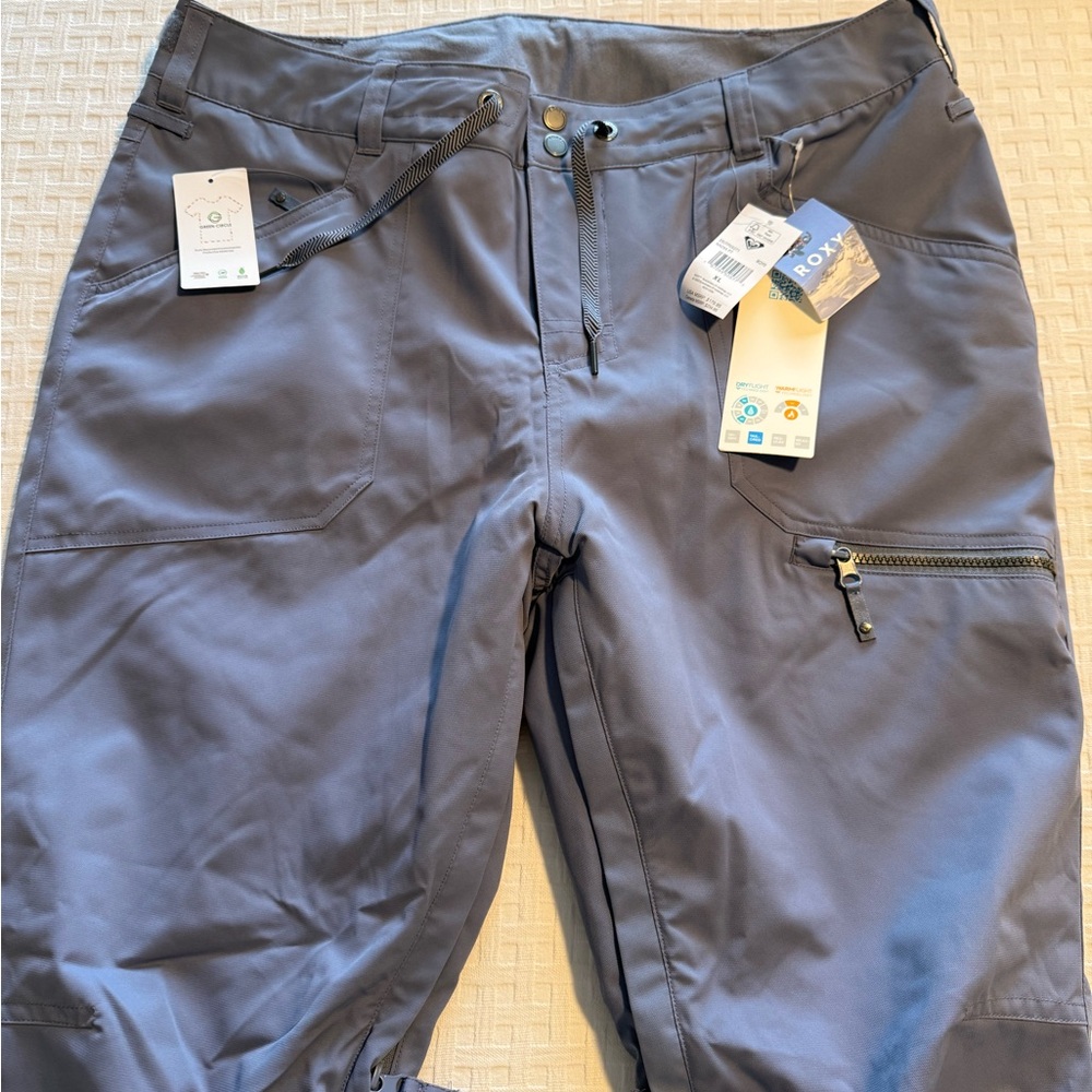 Roxy purple ski/board snow Pants; NWT. Matching jacket in closet